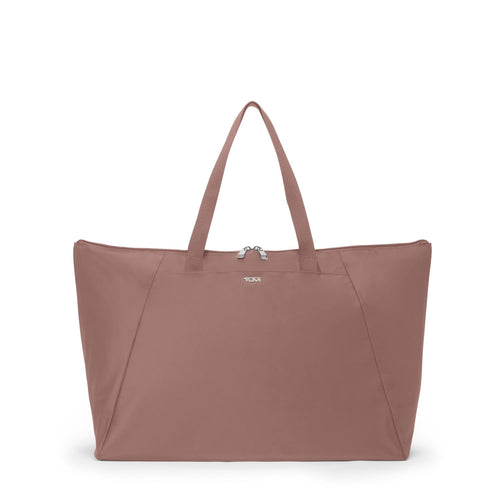 front of light mauve TUMI Voyageur Just In Case Tote