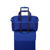 Blue Samsonite rolling suitcase on a white background