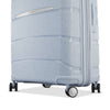 Light blue Samsonite suitcase with speckled pattern on a white background