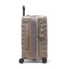 Beige TUMI suitcase on a white background