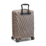 Beige TUMI suitcase with a black handle on a white background