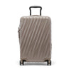 Beige TUMI suitcase with a black handle on a white background