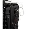 Black TUMI suitcase with a power bank attached on a white background