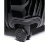 Close-up of a black TUMI suitcase with wheels on a white background