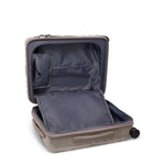 Open beige TUMI suitcase with dark interior on a white background