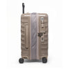 Beige TUMI suitcase with open zipper on a white background