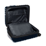Open navy TUMI suitcase on a white background