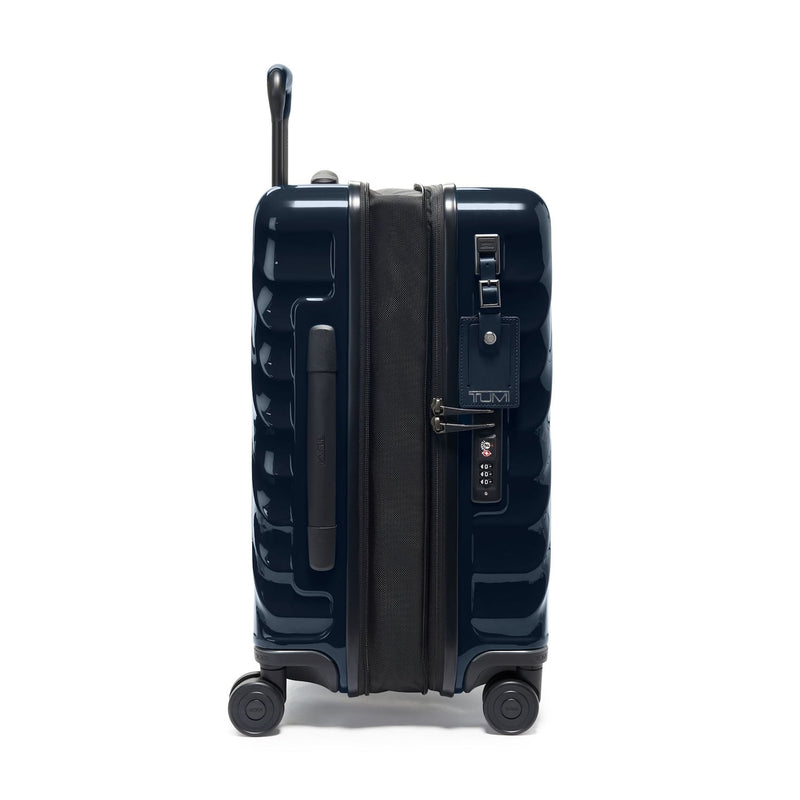 Dark blue TUMI suitcase with wheels and handle on a white background
