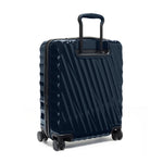 Navy TUMI suitcase with a black handle on a white background