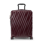 Maroon TUMI suitcase with diagonal stripes on a white background