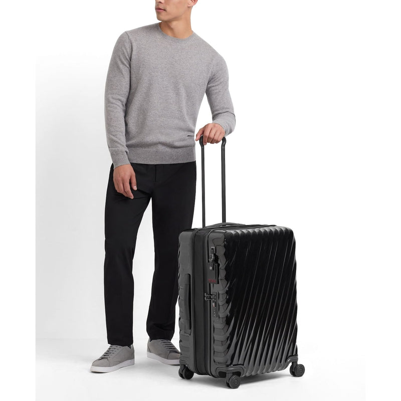 model with black 19 Degree Short Trip Packing Case