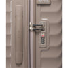 Close-up of a beige TUMI suitcase with a handle and combination lock.