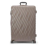 Beige TUMI suitcase with a pattern on a white background