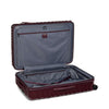 Open maroon TUMI suitcase with a visible brand logo on a white background