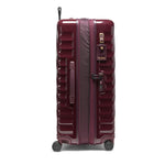 Maroon TUMI suitcase with wheels and handle on a white background