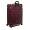 Maroon TUMI suitcase with black handle on a white background