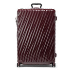 Maroon TUMI suitcase with diagonal stripes on a white background