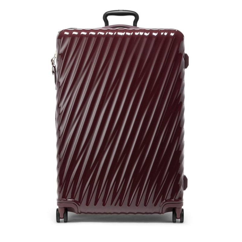 Maroon TUMI suitcase with diagonal stripes on a white background