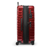 Red TUMI suitcase with black accents on a white background