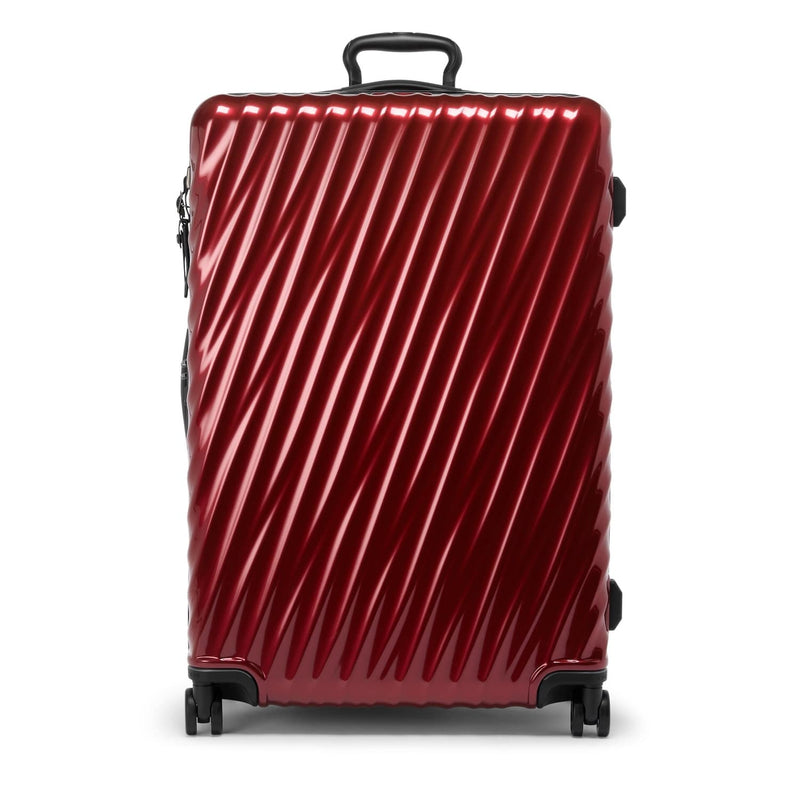 Red TUMI suitcase on a white background