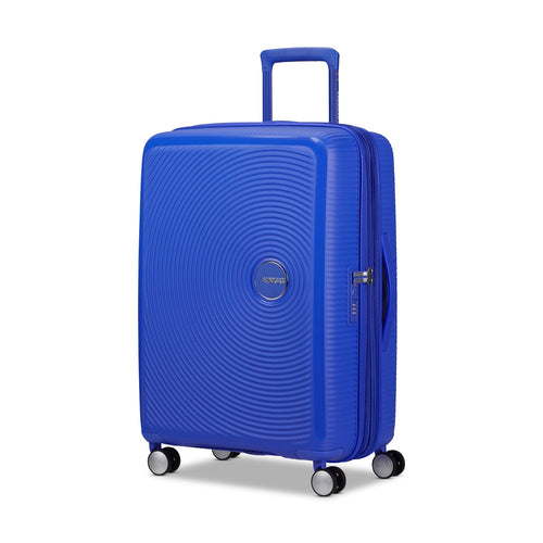 front of cobalt blue American Tourister Curio Spinner Medium Expandable