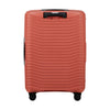 Red Samsonite suitcase with a textured surface on a white background