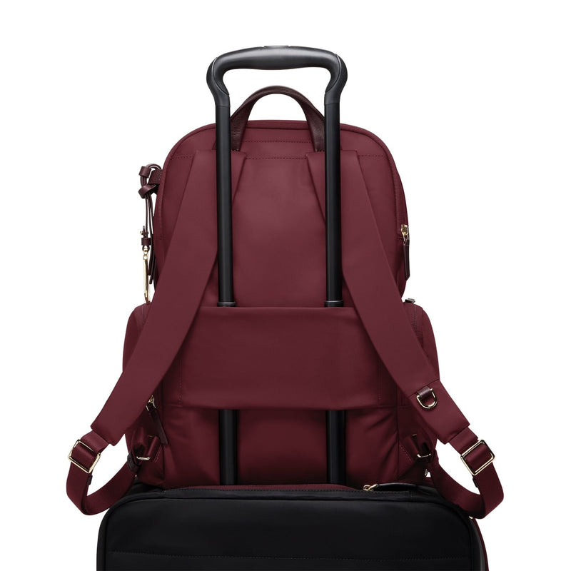 Wine TUMI backpack on a white background