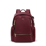 Wine TUMI backpack with gold zippers on a white background