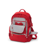 Red TUMI backpack with key chain on white background