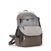 Mink TUMI backpack with a front pocket on a white background