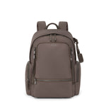 Mink TUMI backpack on a white background