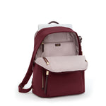 Wine TUMI backpack with beige interior on a white background