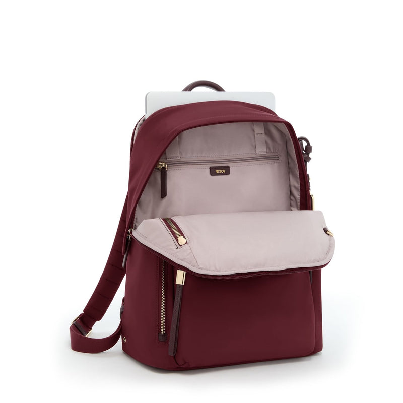 Wine TUMI backpack with beige interior on a white background