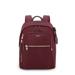 Wine TUMI backpack with gold zippers on a white background
