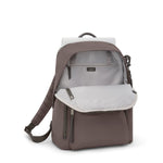 Mink TUMI backpack with a white compartment on a white background