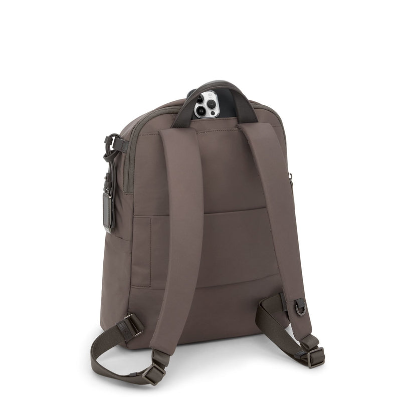 Mink TUMI backpack on a white background