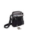 key leash of black/gunmetal TUMI Voyageur Persia Crossbody