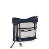 front pocket of indigo TUMI Voyageur Tyler Crossbody