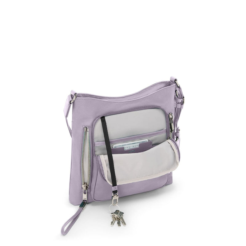 front pocket of lavender TUMI Voyageur Tyler Crossbody