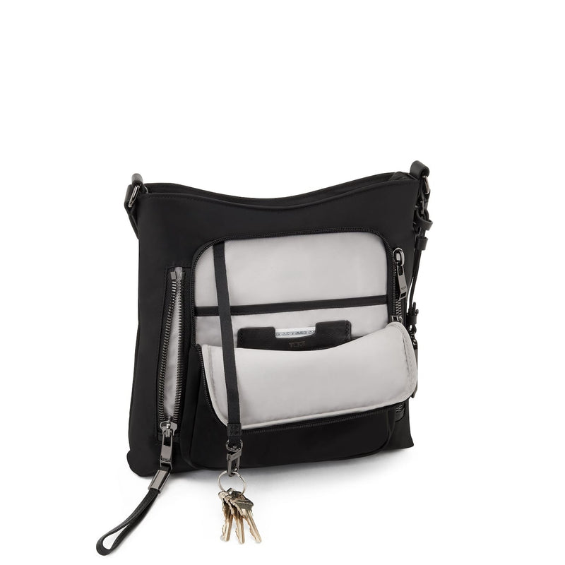 front pocket of black/gunmetal TUMI Voyageur Tyler Crossbody