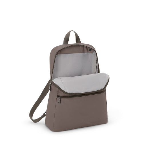 Mink TUMI backpack on a white background