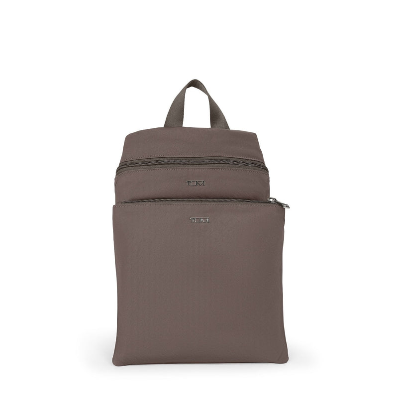 Mink TUMI backpack on a white background