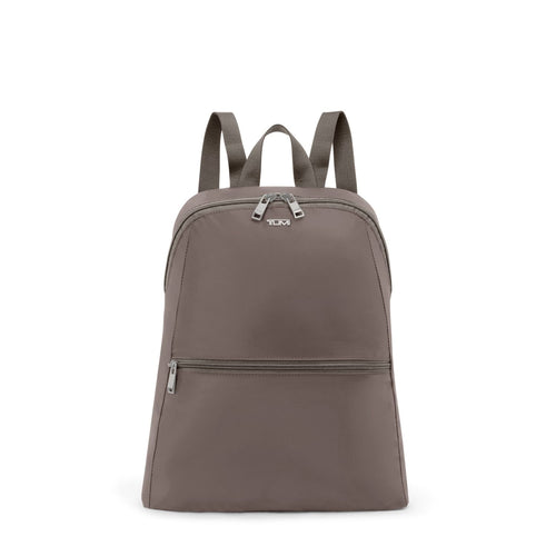 Mink TUMI backpack on a white background