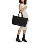 model with black/gold TUMI Voyageur Just In Case Tote