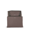Mink TUMI bag on a white background