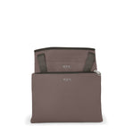 Mink TUMI bag on a white background