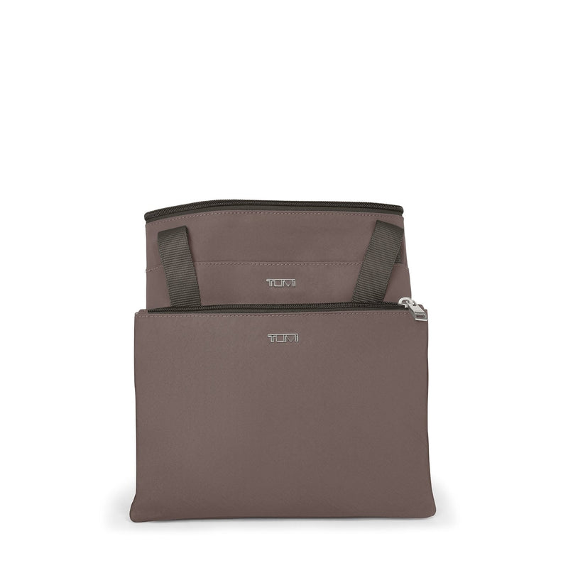 Mink TUMI bag on a white background
