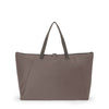 Mink TUMI tote bag on a white background