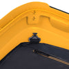 Close-up of a yellow and black Samsonite suitcase with a handle and zipper.