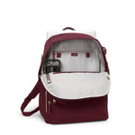 Maroon TUMI backpack with white interior on a white background